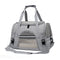 Gray pet carrier with mesh front on a white background