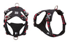 Black dog harness with red accents on a white background