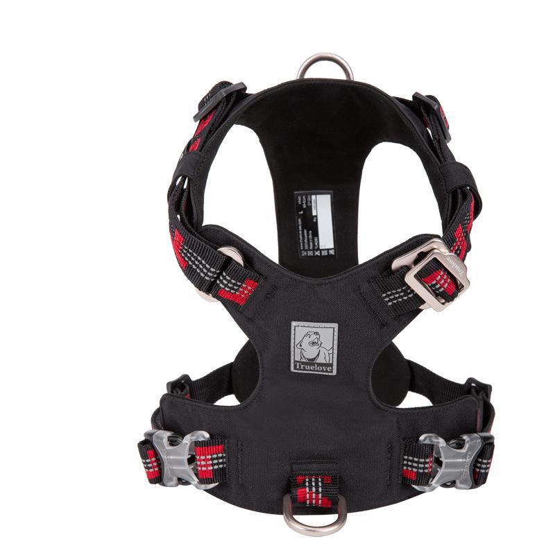 Black dog harness with red accents on a white background