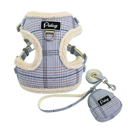 Plaid dog harness and leash set with visible brand label on a white background