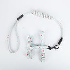 Dog harness with floral pattern on a white background