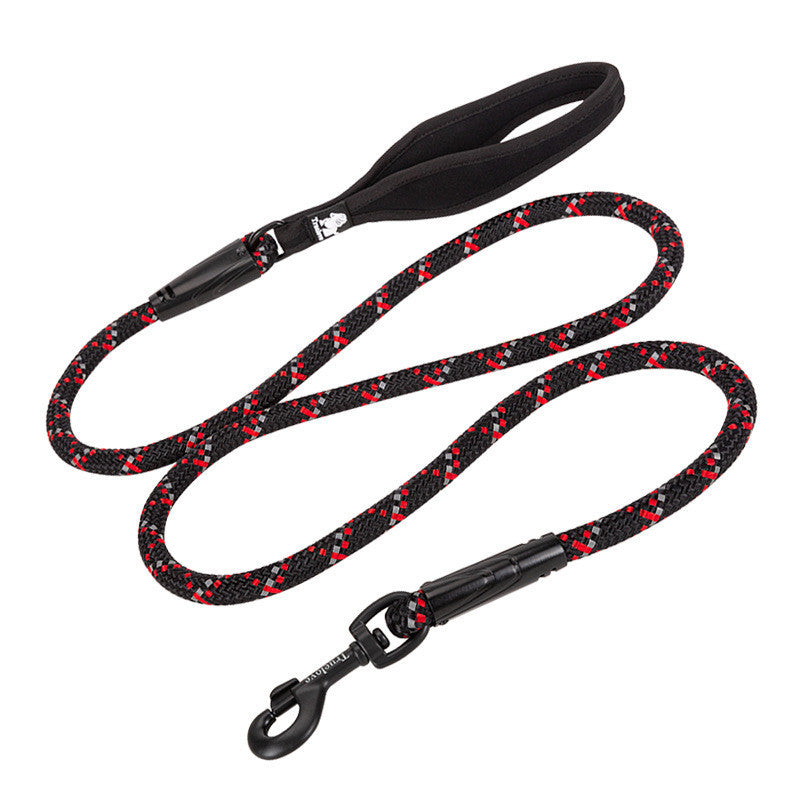 Black dog leash with red speckles on a white background