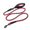 Red patterned dog leash with black clip on a white background