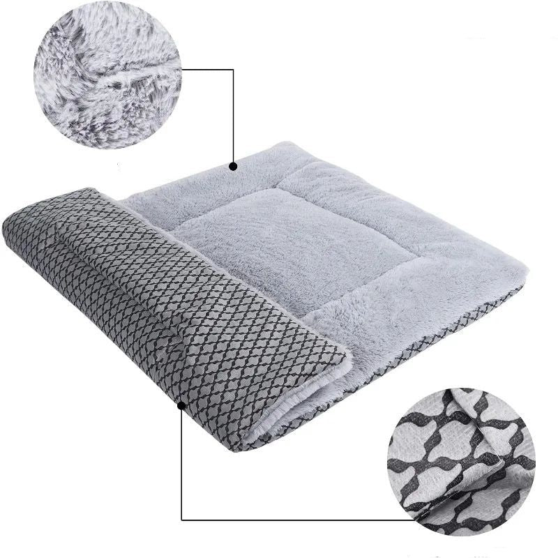 Gray pet bed with textured surface and comfort rest feature, on a white background.