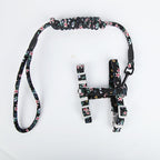 Floral-patterned dog leash and harness set on a white background