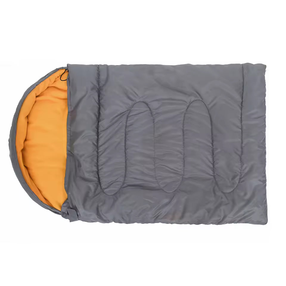 Gray sleeping bag with orange interior on a white background