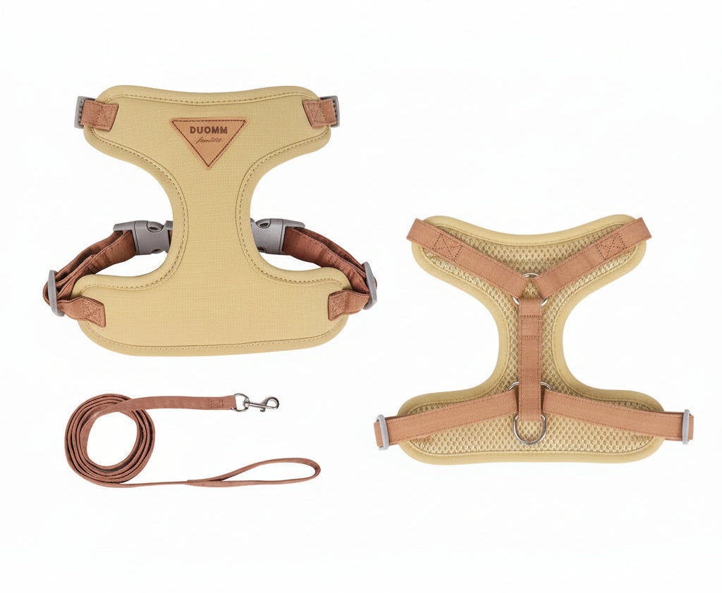Beige dog harness and leash set with DUOMM branding on a white background.