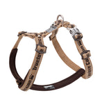 Dog harness with brown and beige straps on a white background