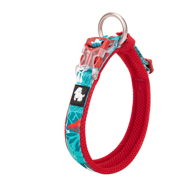Red dog collar with colorful pattern on a white background