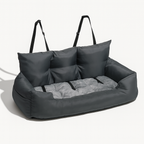 Gray pet bed with handles on a white background