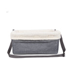 Gray fabric bag with a white fur top on a white background