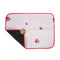 Quilted pet mat with red paw prints on a white background